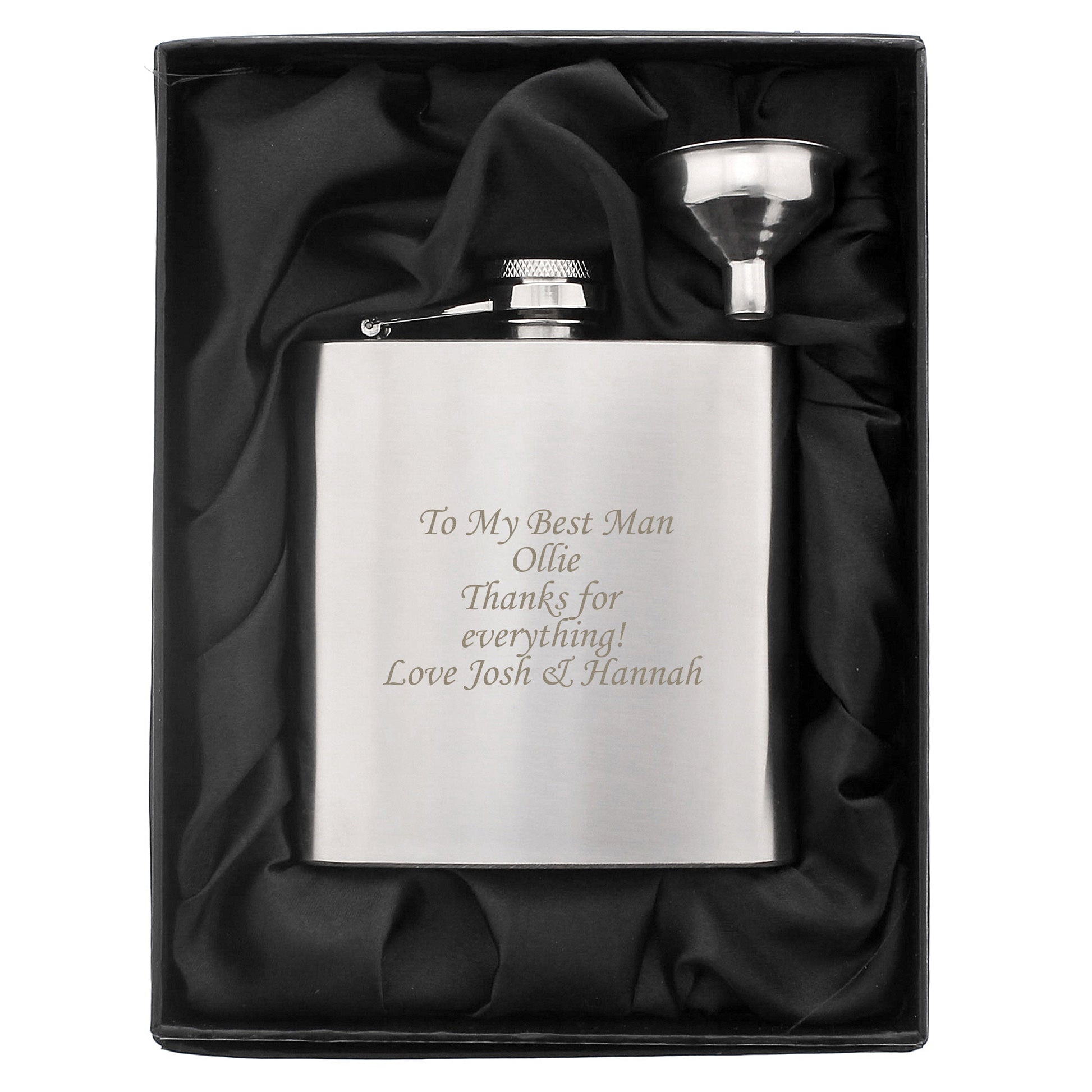 Silver hip flask with engraved text in a black satin-lined box