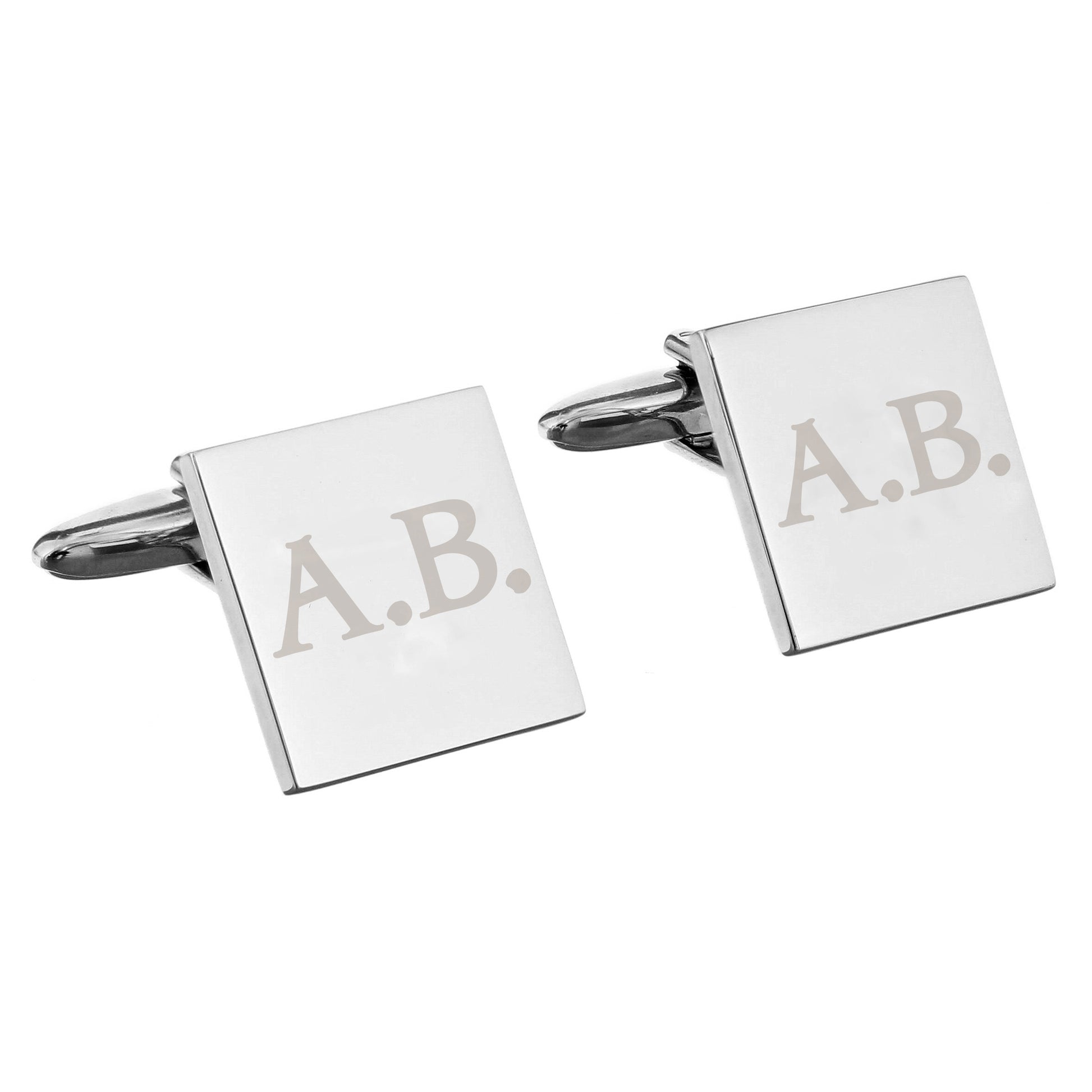 Square cufflinks with 'A.B.' engraving on a white background