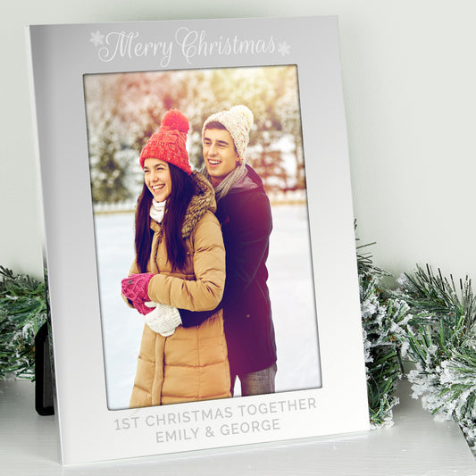Personalised photo frame with a couple's photo and 'Merry Christmas' text, surrounded by festive decorations.