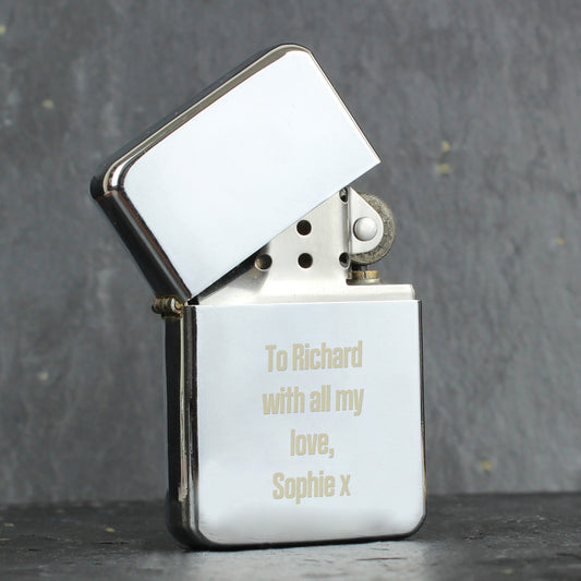 Personalised Lighter with engraved message on a dark background