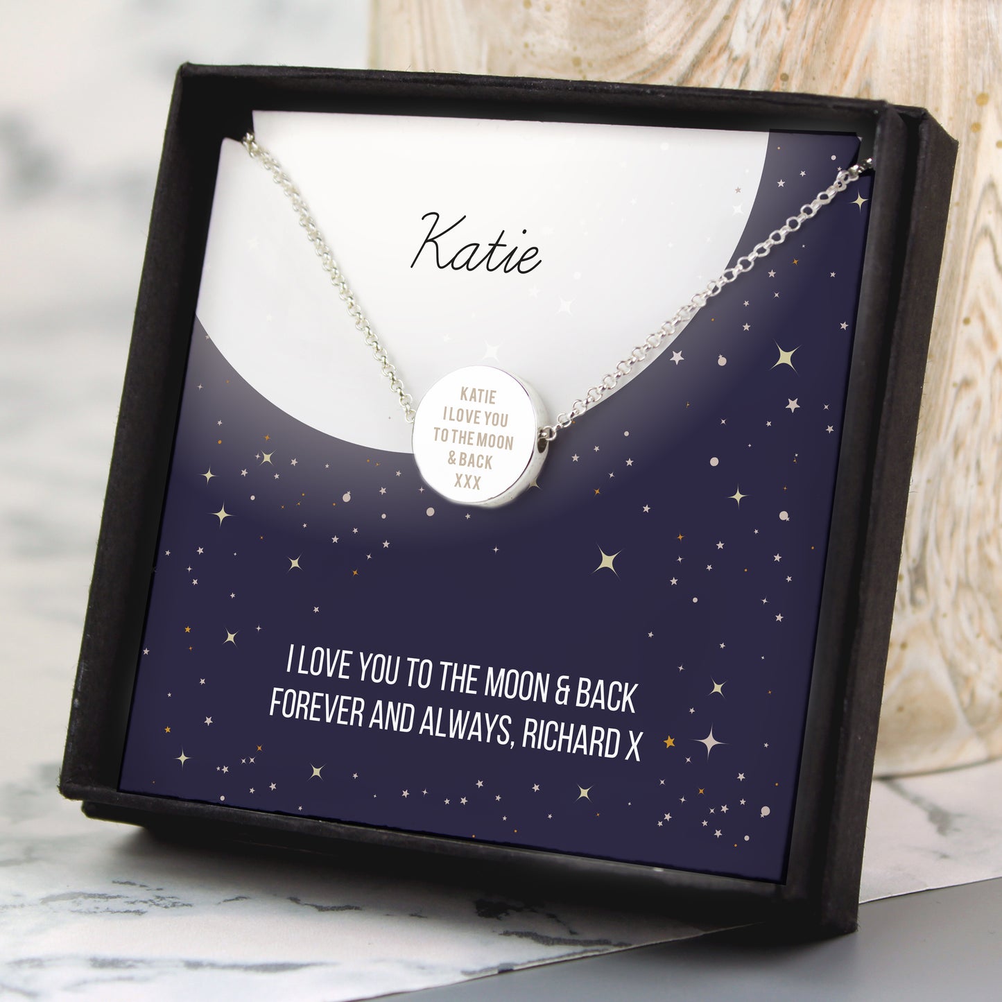 Necklace with a heart-shaped pendant in a personalised gift box with engraved message.