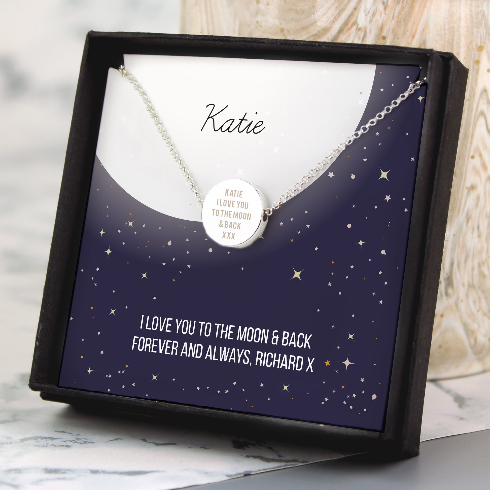 Necklace with a heart-shaped pendant in a personalised gift box with engraved message.