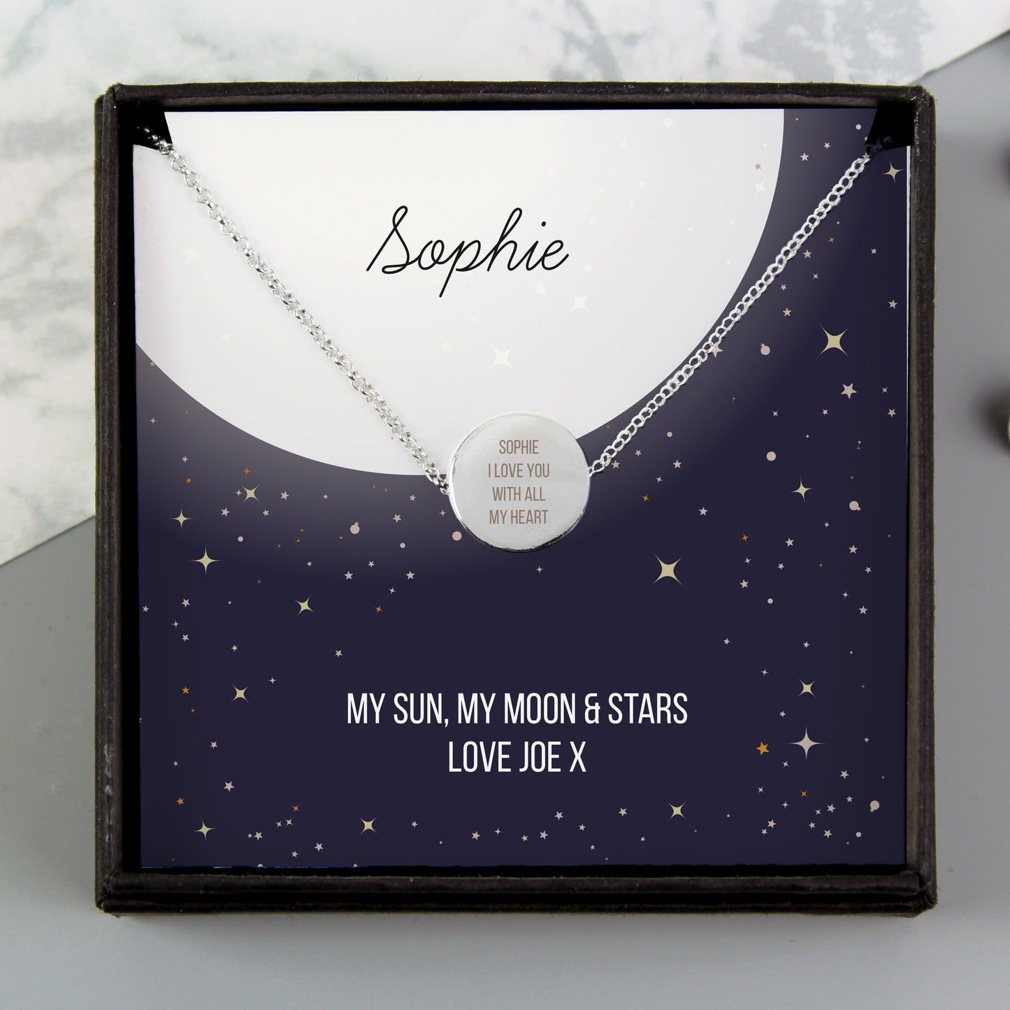 Necklace with a heart pendant in a personalised box with 'Sophie' and a message.