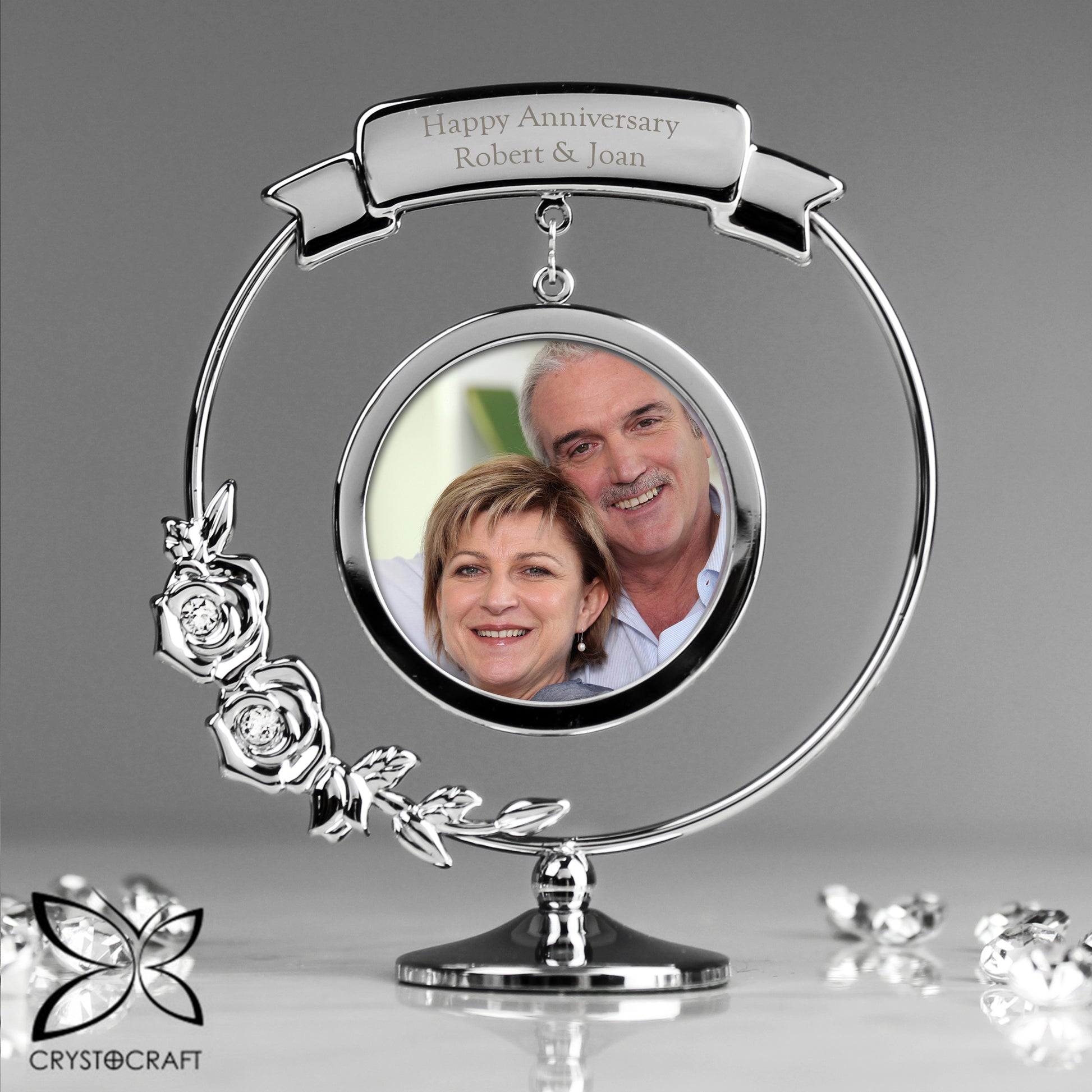 Personalised Silver anniversary photo frame with a couple's photo inside, featuring the brand 'Cryostcraft'.