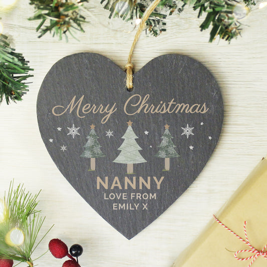 Personalised Heart-shaped Christmas decoration with 'Merry Christmas Nanny' text, surrounded by festive elements.