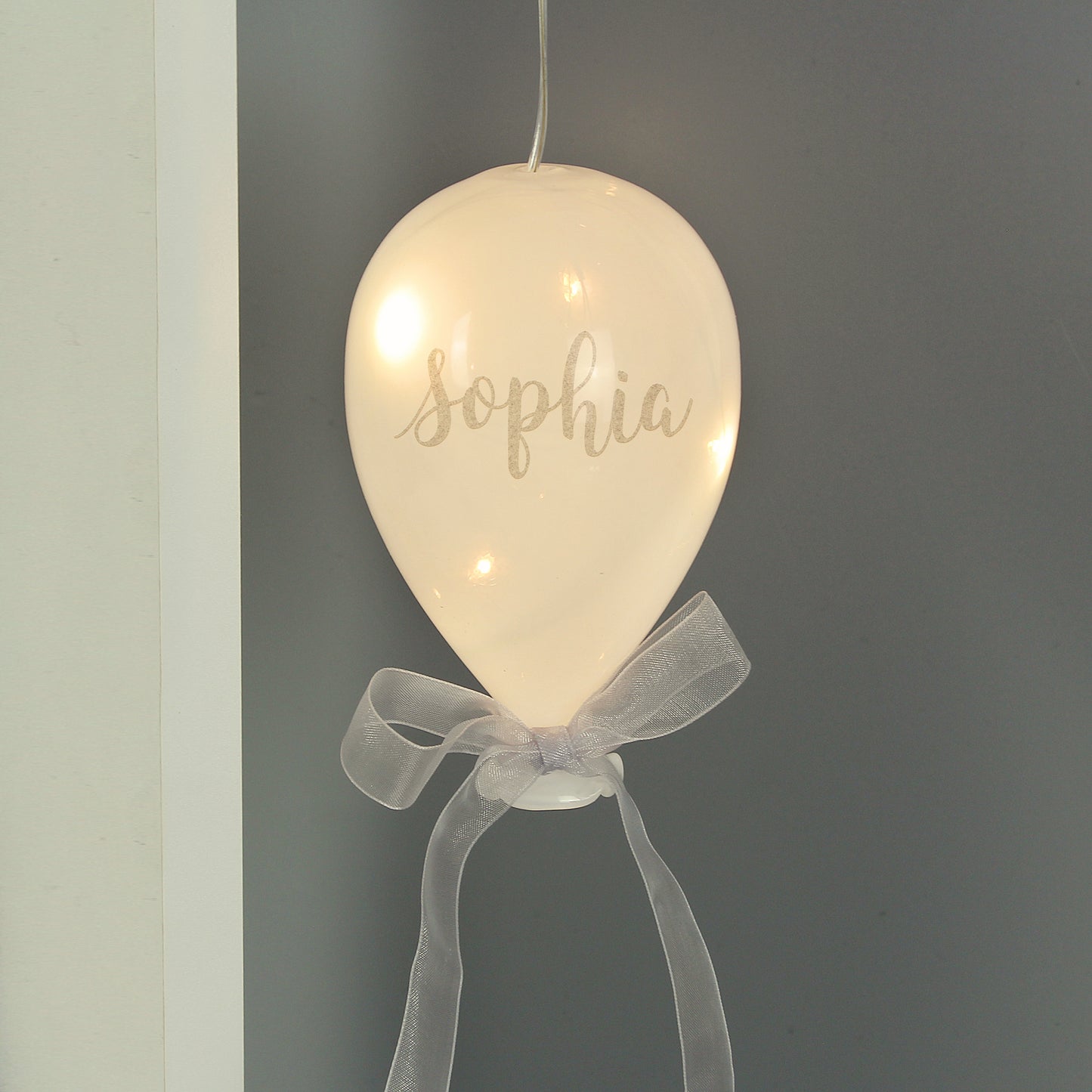 Personalised Decorative light shaped like a balloon with the name 'Sophia' on a plain background