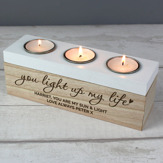 Three-tealight holder with personalised engraved message on a wooden base