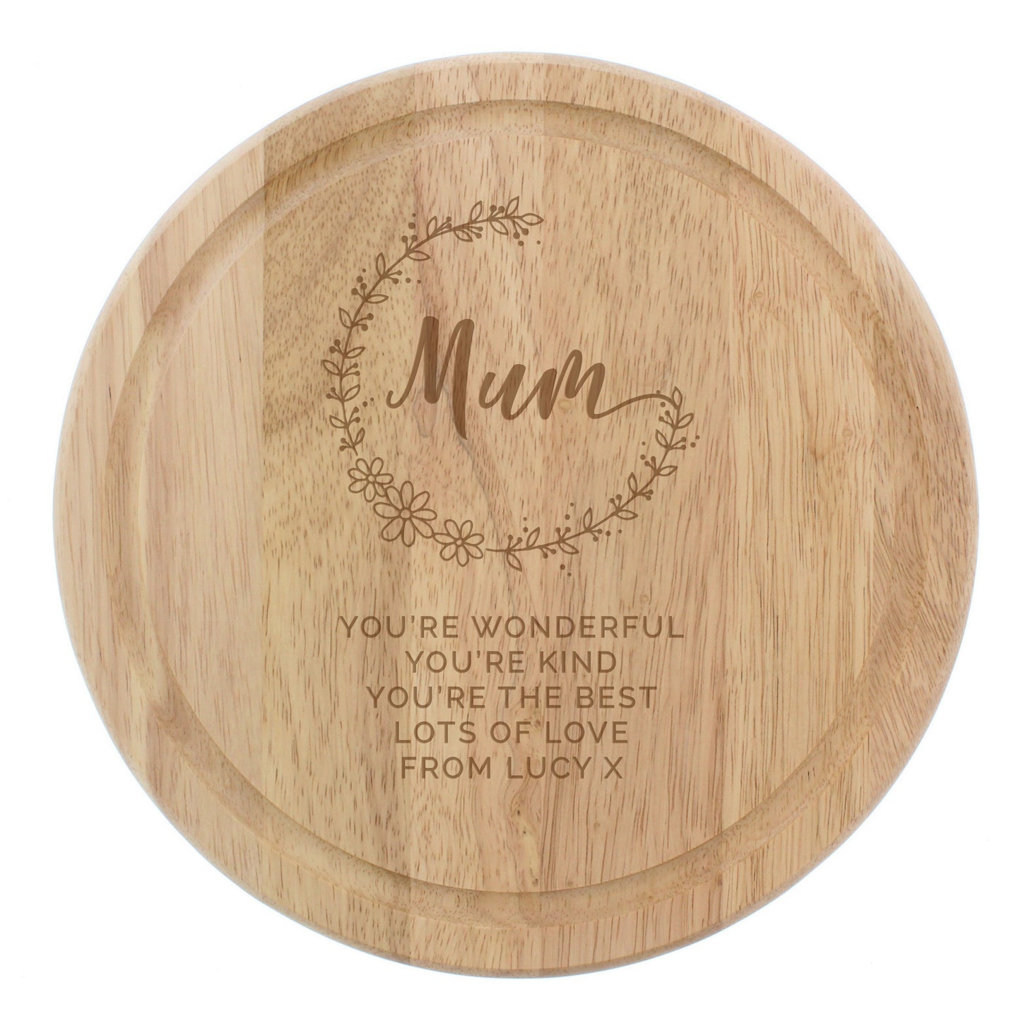 Wooden round tray with engraved message and floral design on a white background