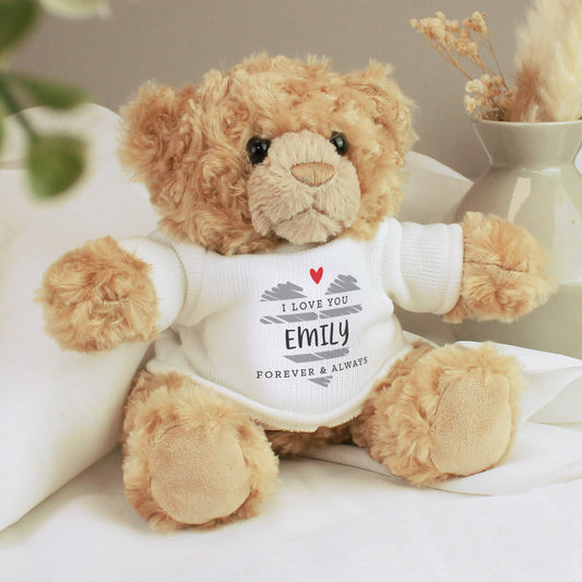 Personalised Teddy bear wearing a shirt with 'I Love You Emily Forever & Always' text on a light background.