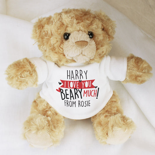 Teddy bear wearing a shirt with personalised text on a white background