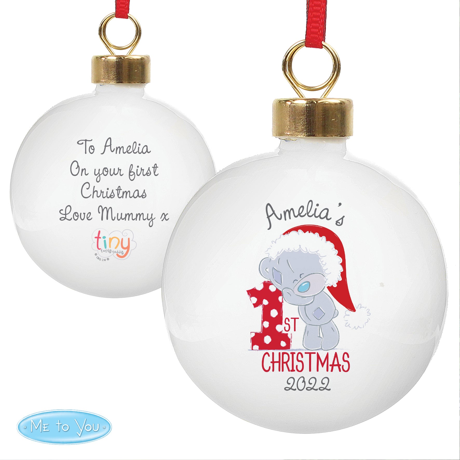 Christmas ornament with text and a teddy bear design on a white background