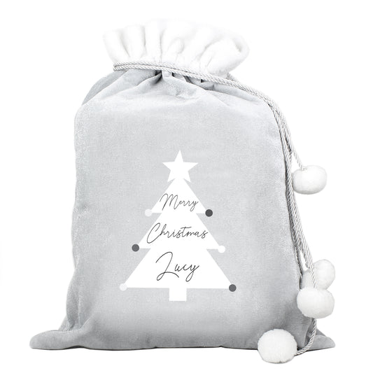 Personalised Gray drawstring bag with white Christmas tree design and 'Merry Christmas Lucy' text on a white background