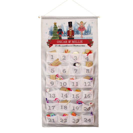 Personalised Advent calendar with festive design and 'Oscar & Millie' branding on a white background