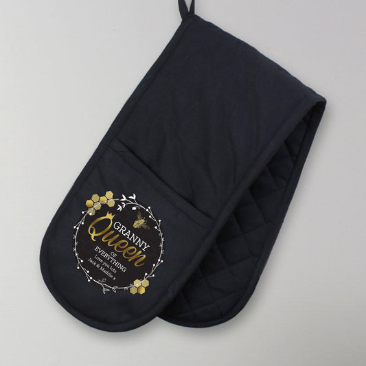 Personalised Black oven mitt with 'Granny Queen' text on a grey background