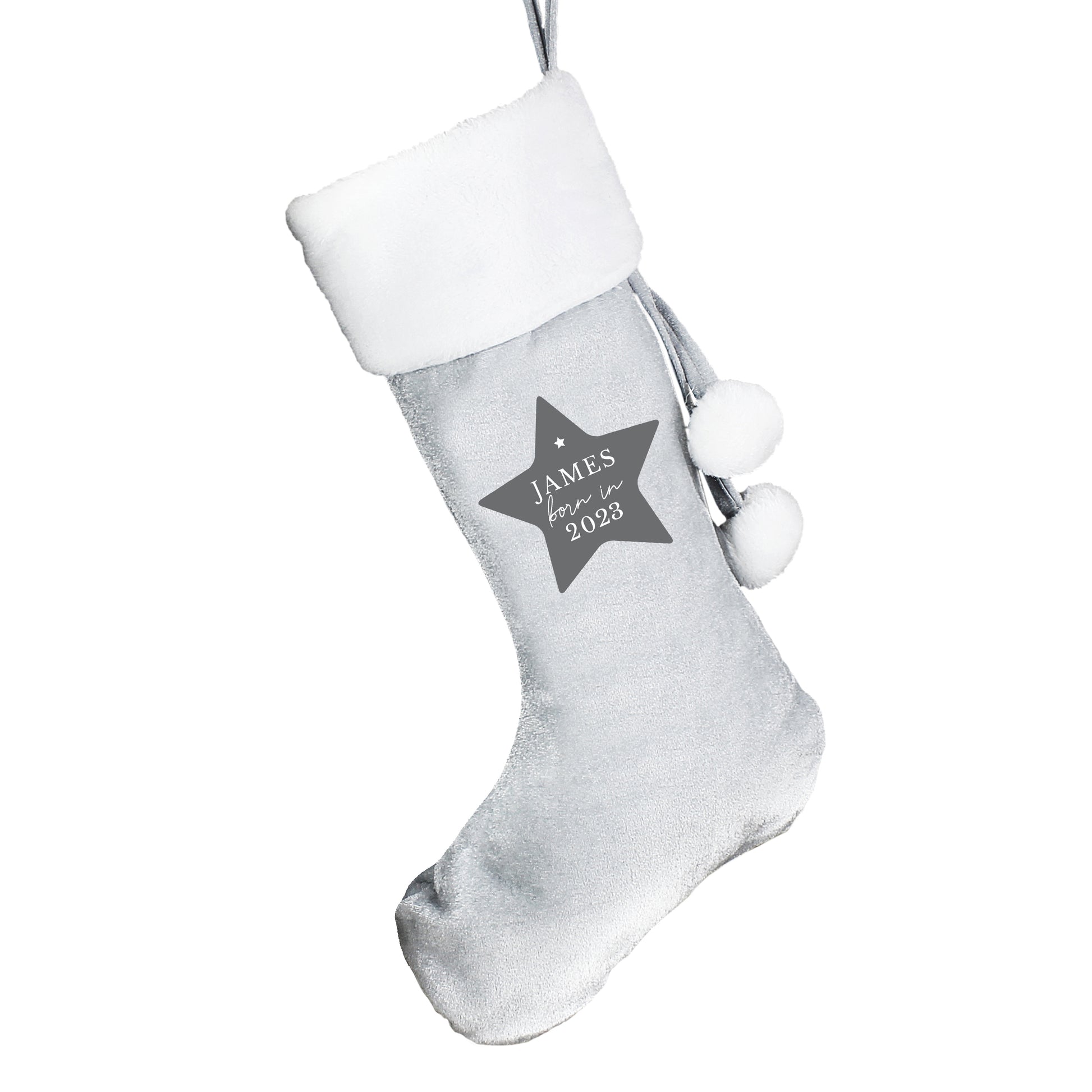 Gray Christmas stocking with white top and pom-pom details on a white background
