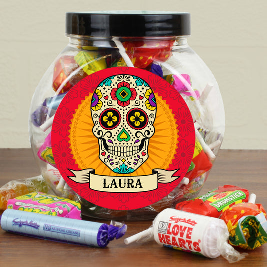 Jar of colorful candies with a personalised label on a wooden surface