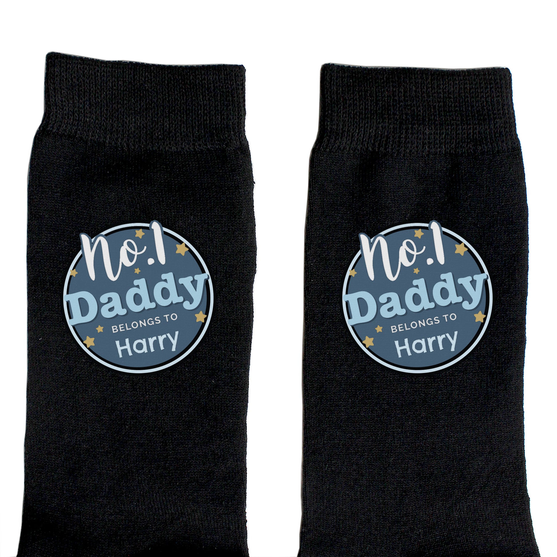 Black socks with 'No.1 Daddy Belongs to Harry' text on a white background