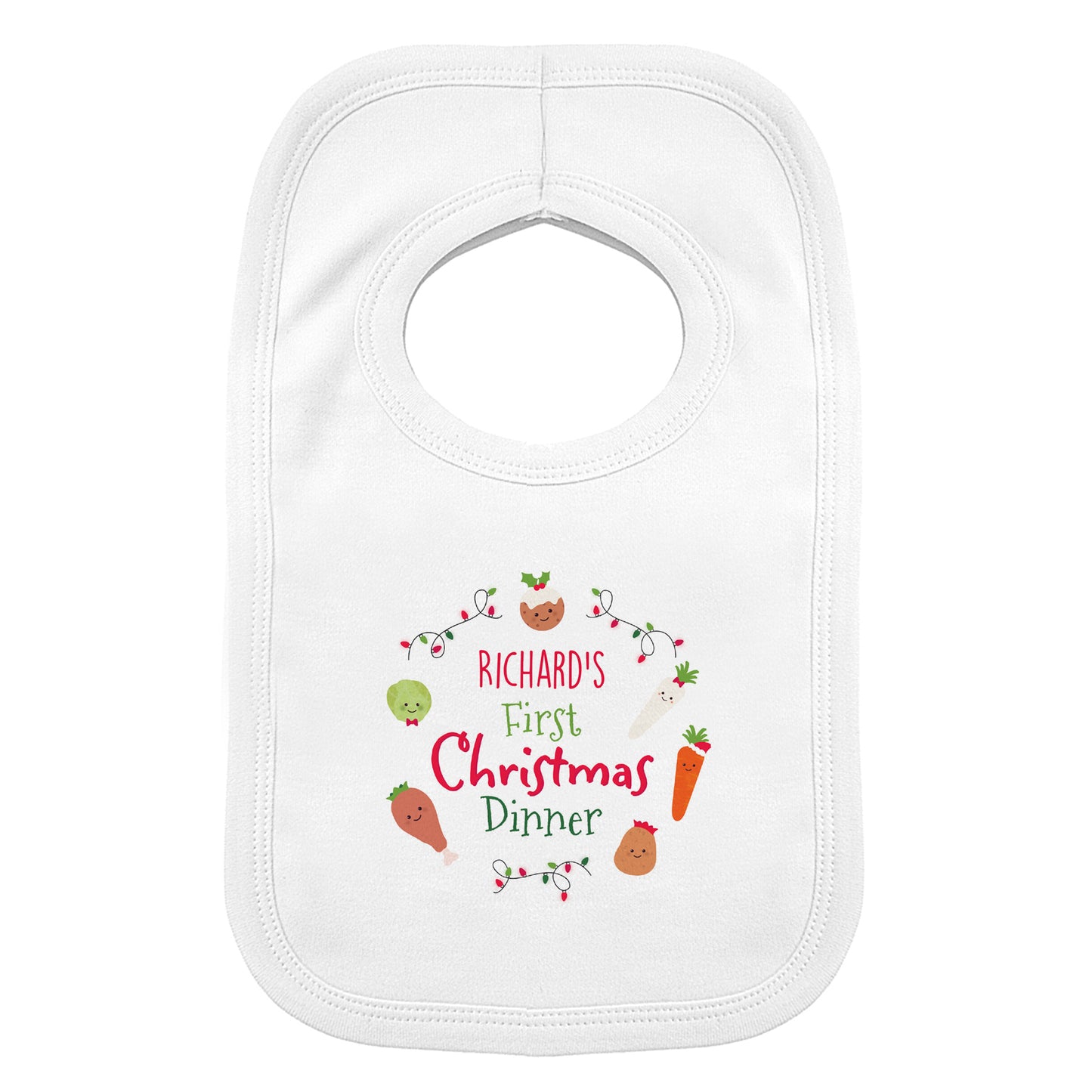 White bib with 'Richard's First Christmas Dinner' text and festive graphics on a white background
