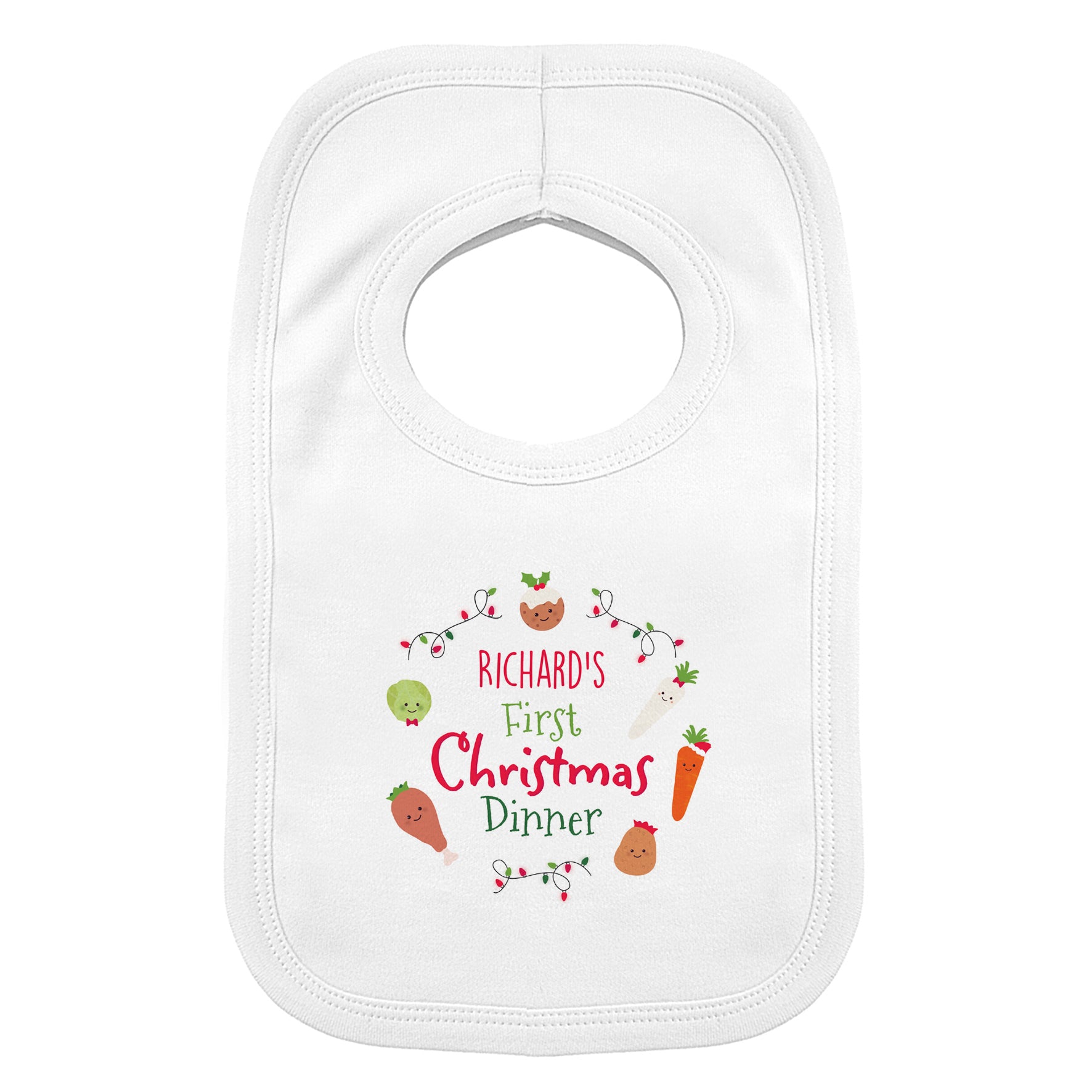 White bib with 'Richard's First Christmas Dinner' text and festive graphics on a white background