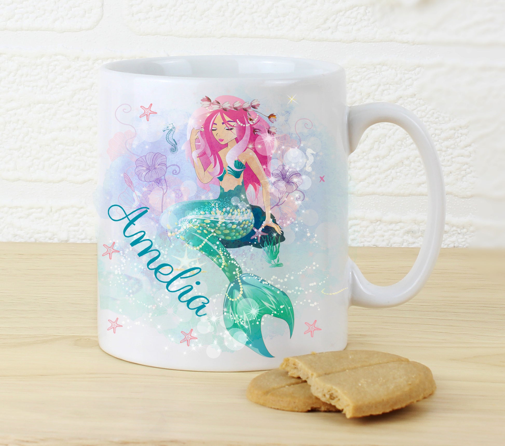 Mug with a mermaid design and the name 'Amelia' on a wooden surface with a light background