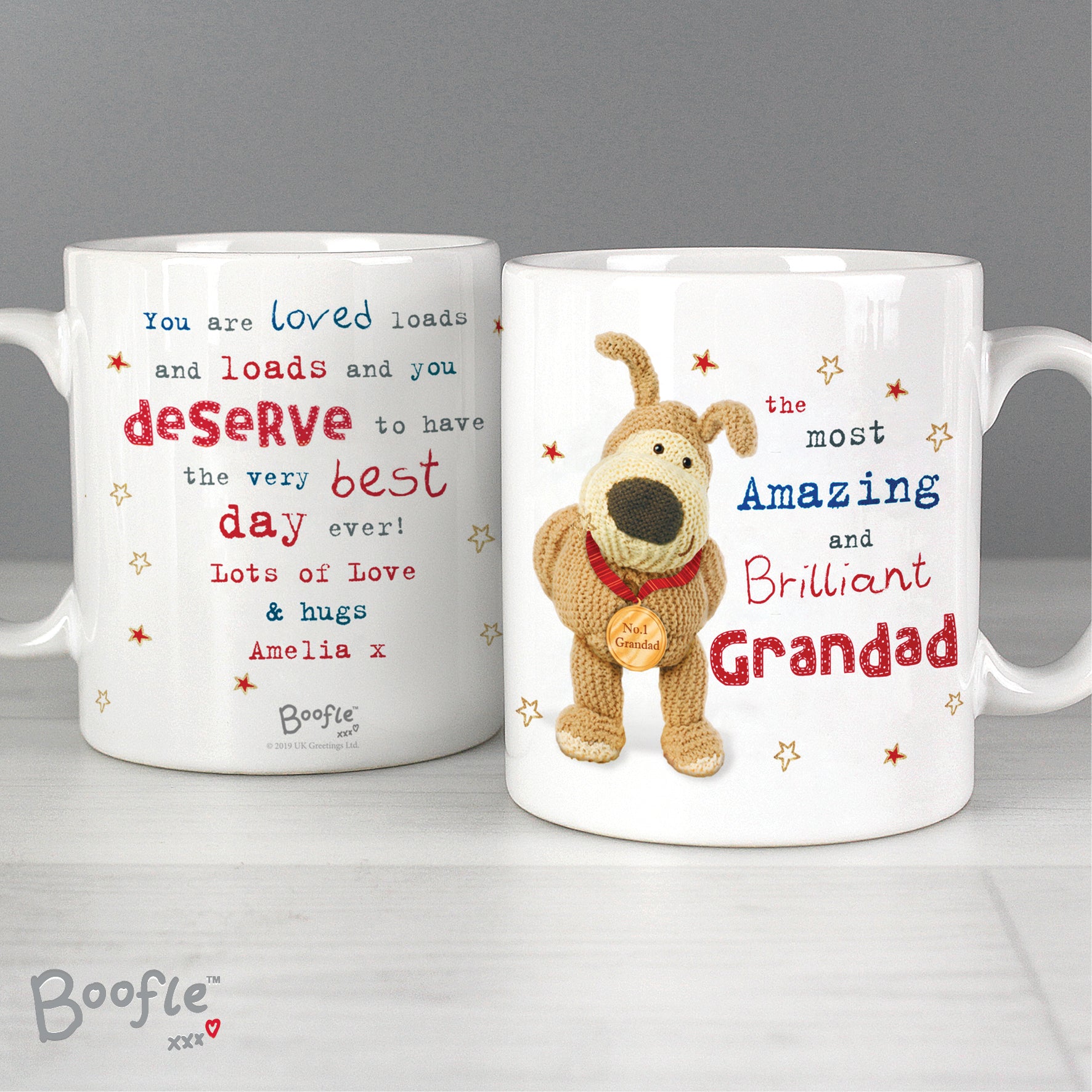 Two mugs with text and a cartoon dog character on a grey background