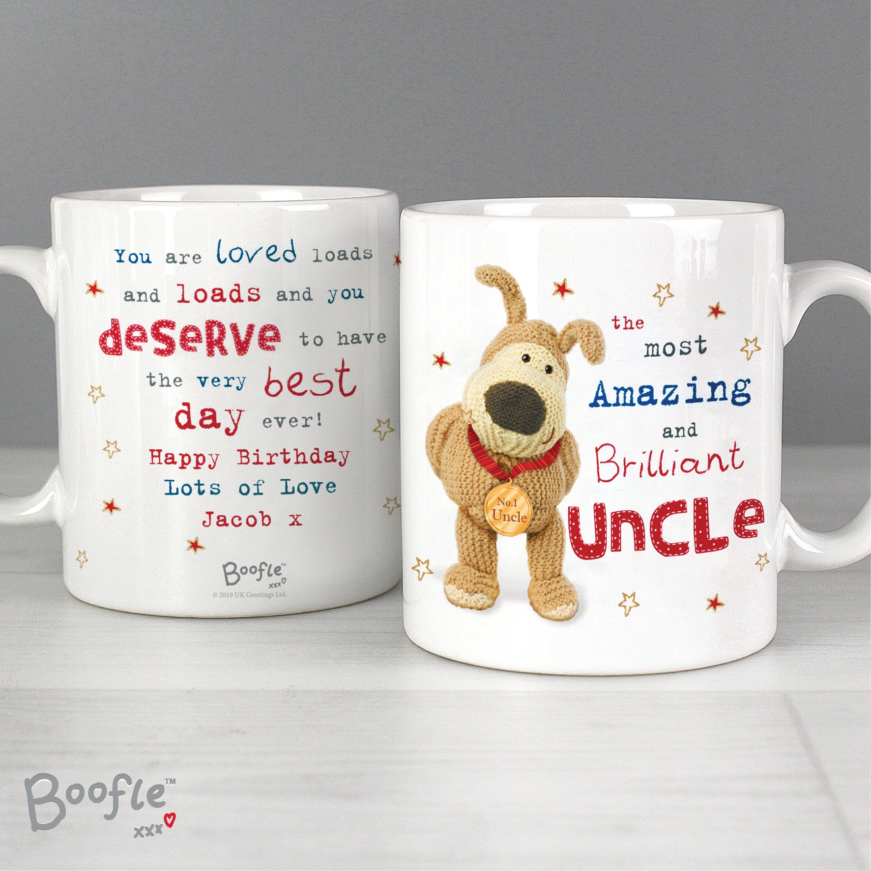 Two mugs with Boofle design and personalized text on a grey background