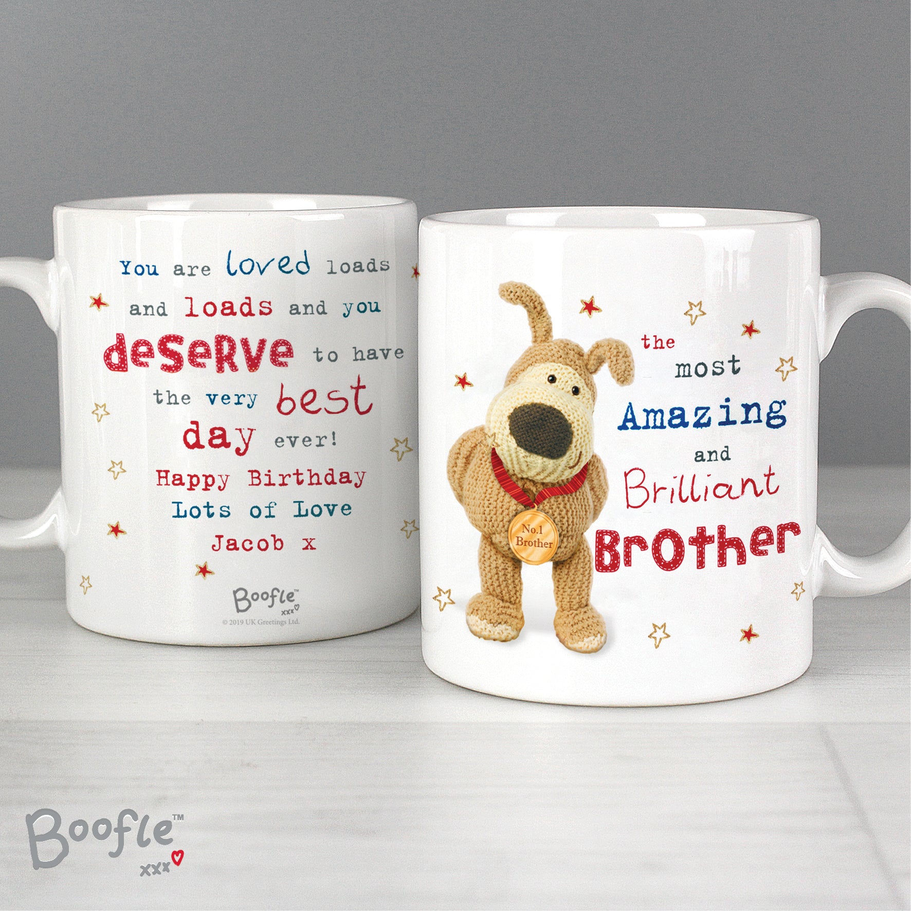 Two Boofle-themed mugs with personalised text on a grey background