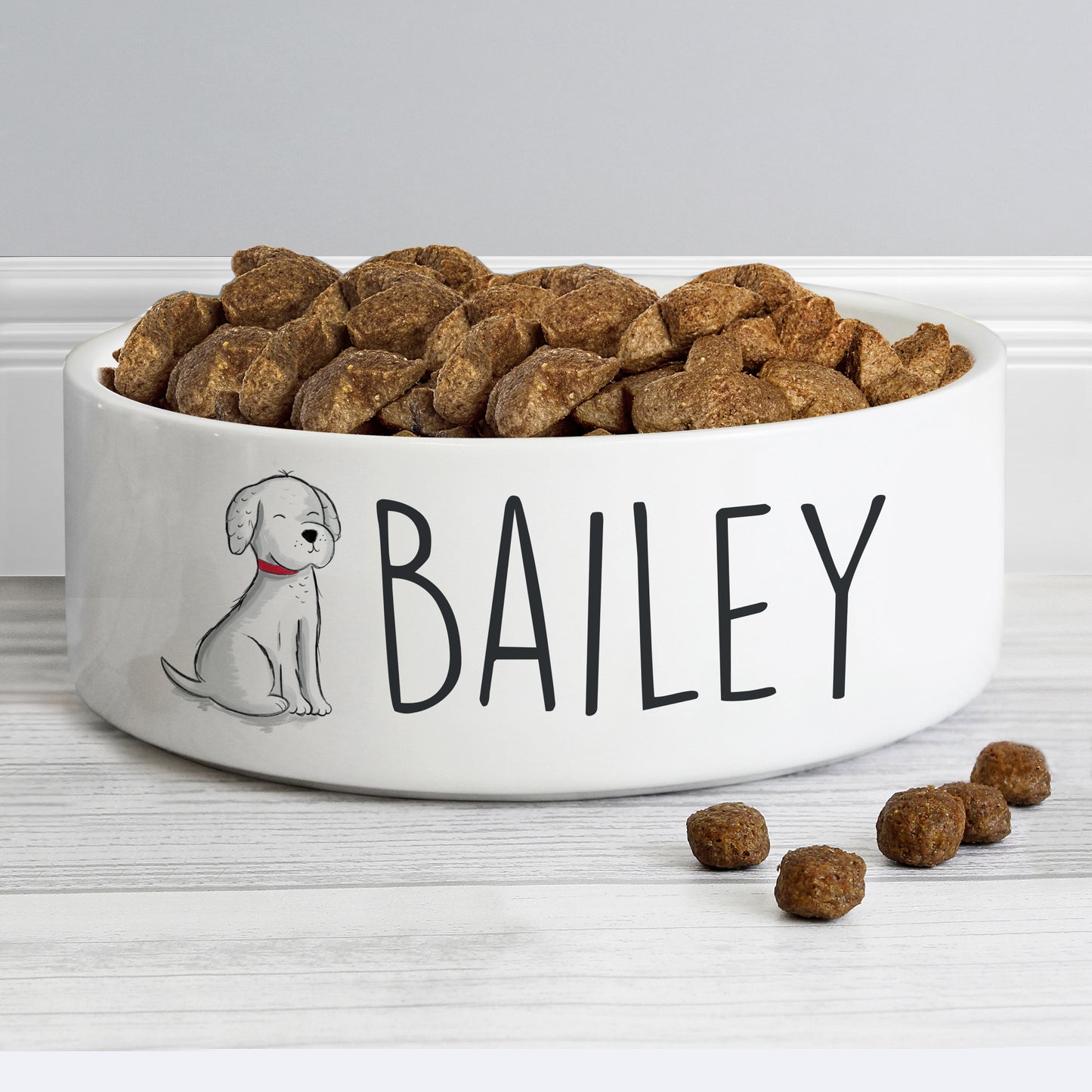 Dog food bowl with 'BAILEY' and a dog illustration on a white background