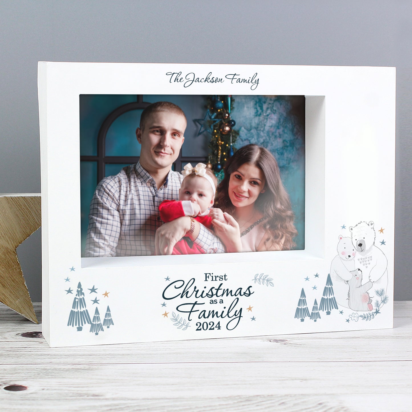 Personalised photo frame with a family photo and 'First Christmas as a Family 2024' text.