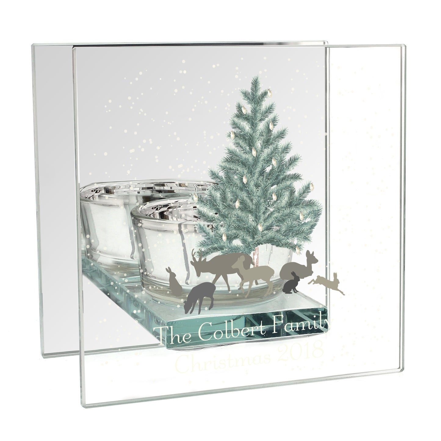 Decorative candle with Christmas tree, reindeer, and personalized text on a white background