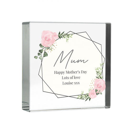 Glass block with floral design and 'Mum' text on a white background