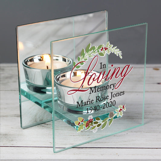 Personalised Glass memorial candle holder with 'In Loving Memory' text and floral design on a wooden surface.