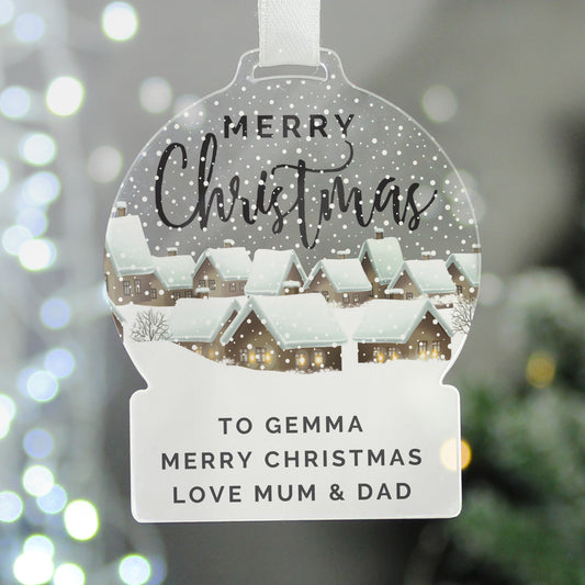 Personalised Christmas ornament with a snowy village scene and personalised text.