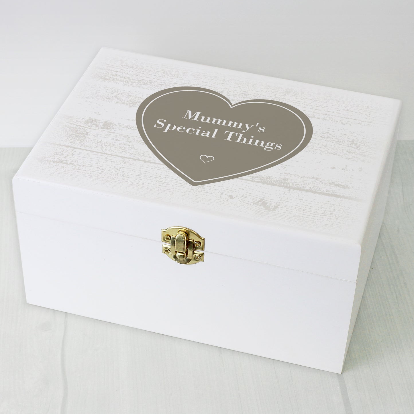 White box with a gold lock and heart-shaped label reading 'Mummy's Special Things' on a light grey background