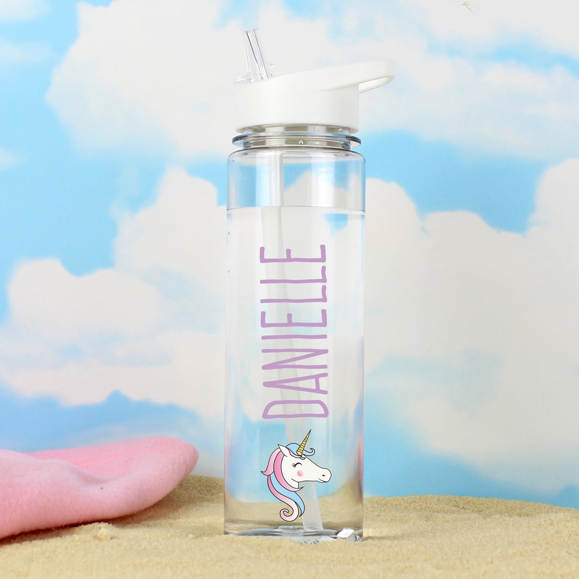 Clear water bottle with unicorn design and 'DANIELLE' text against a cloud background