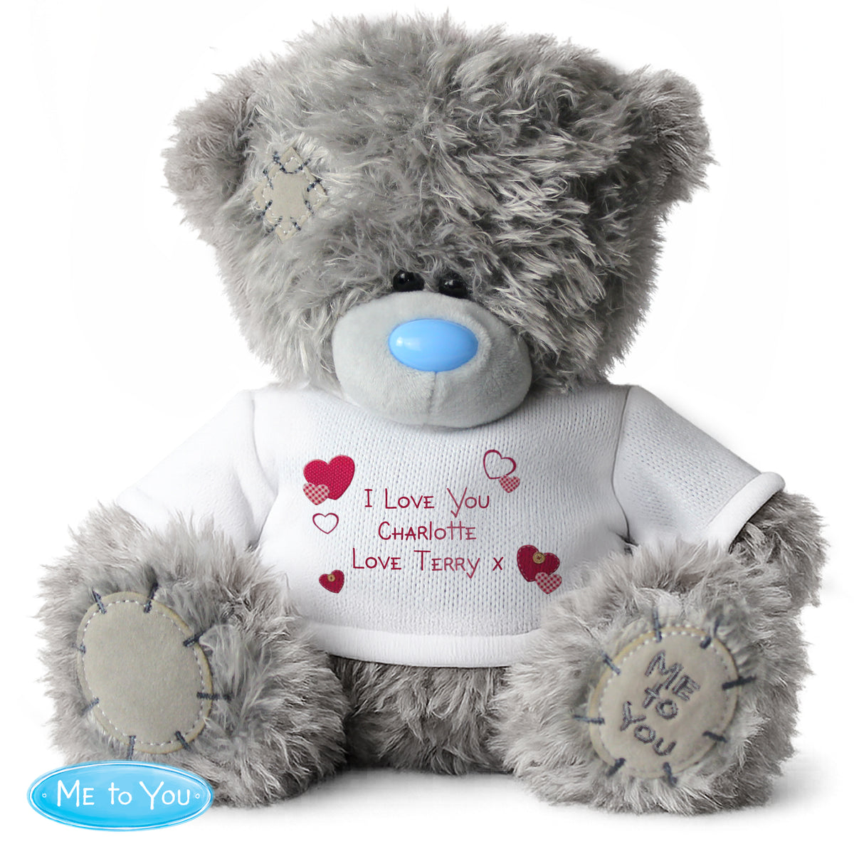 Grae teddy bear wearing a white shirt with personalised text on a white background