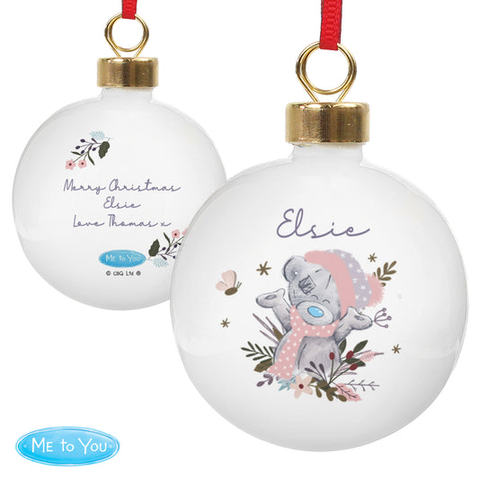 Personalised White Christmas ornaments with floral designs and 'Elsie' text, featuring a bear illustration, on a white background.