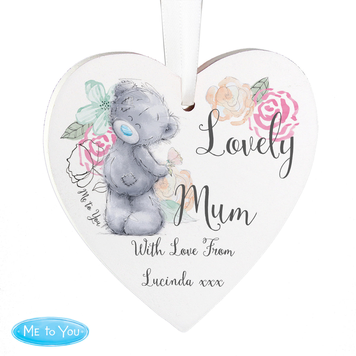 Heart-shaped decorative item with a teddy bear and floral design, featuring the text 'Lovely Mum With Love From Lucinda xxx'.