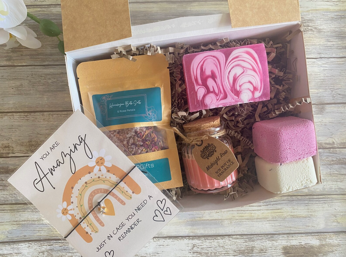 This Teacher pamper hamper includes bath salts, two shower steamers, a rose soap bar, a Midnight Rose candle and a 'You are Amazing' wish bracelet keepsake.