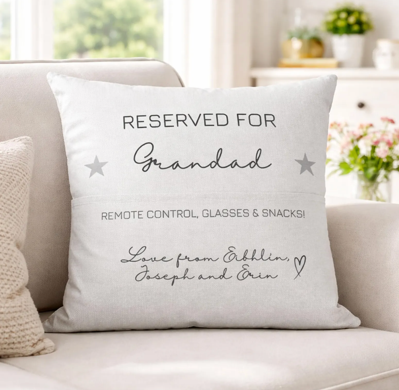 Decorative reserved for Grandad pocket cushion with personalised message on a couch