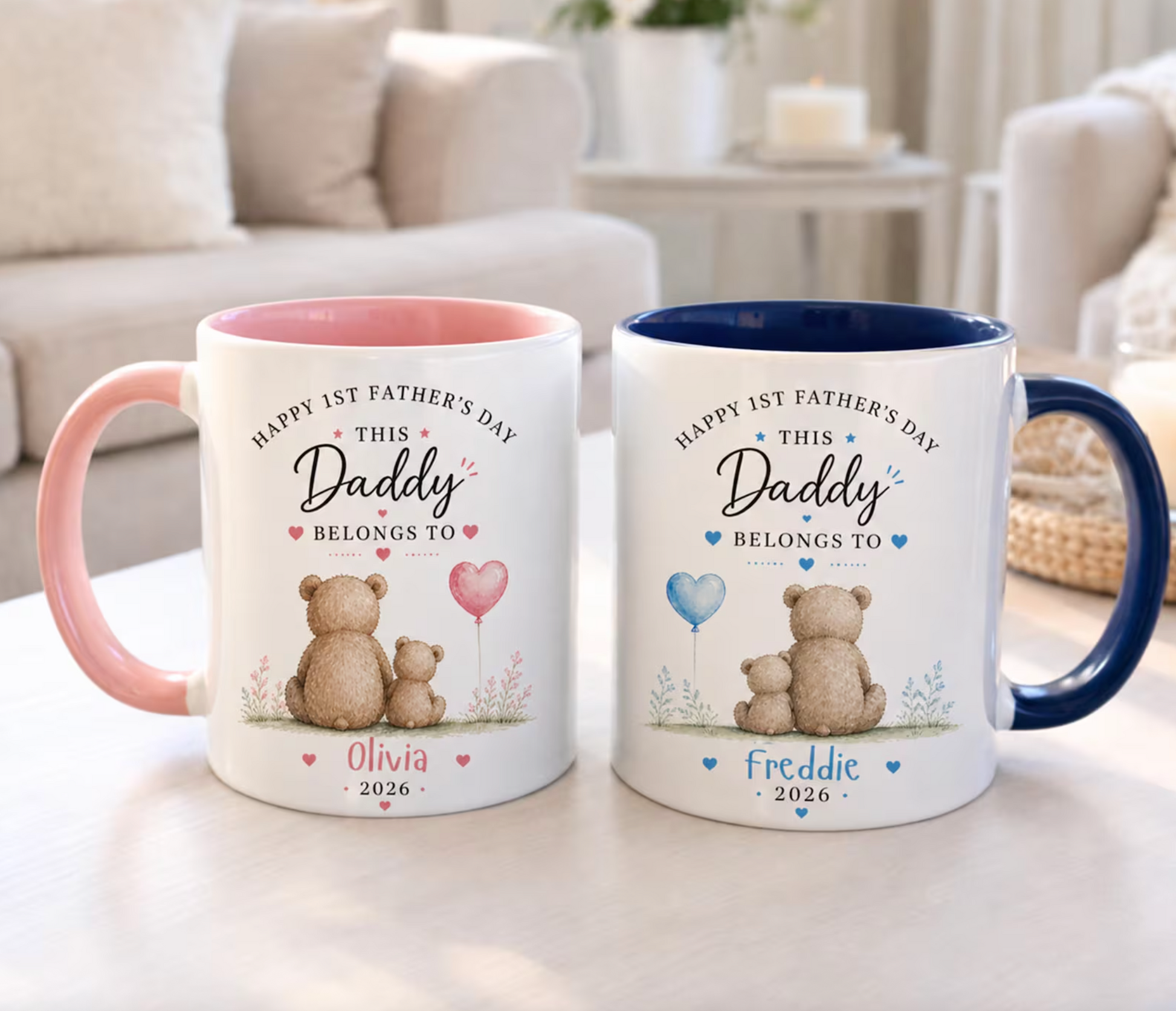 Two personalized Father's Day mugs with teddy bears and text on a table.