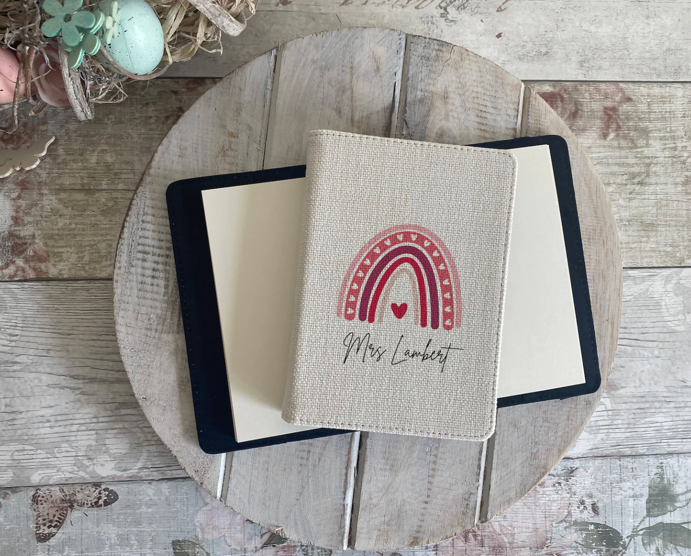 Personalised Teacher Notebook with a rainbow design and text on a wooden surface