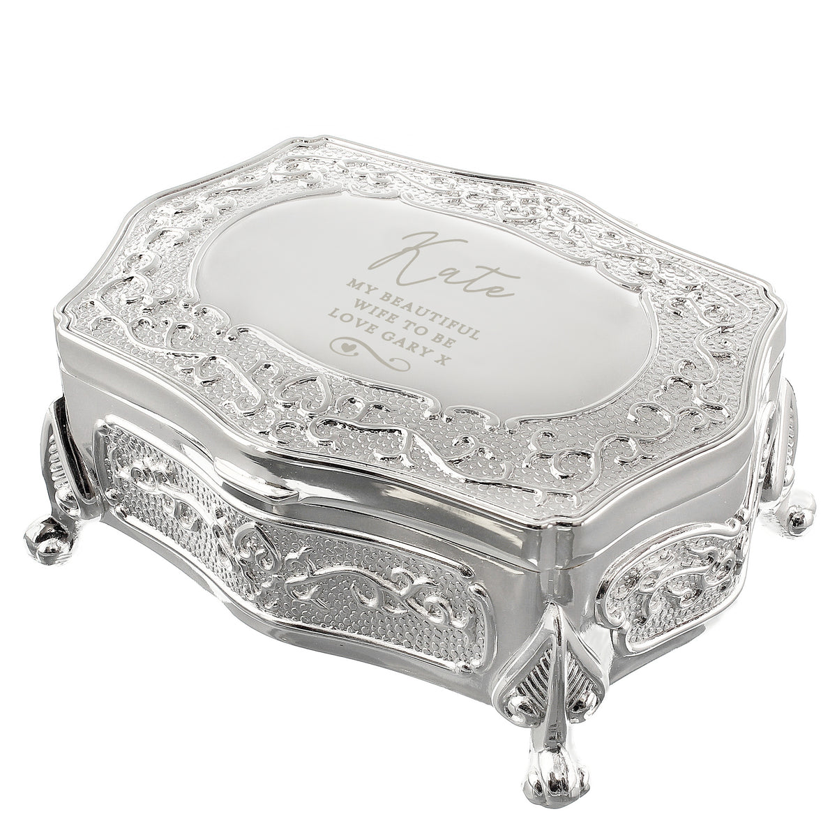 Decorative silver jewelry box with engraved text on a white background