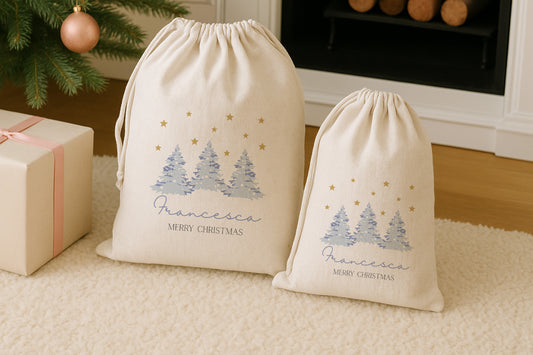 Two Christmas-themed gift bags with decorative trees and text on a carpeted floor.
