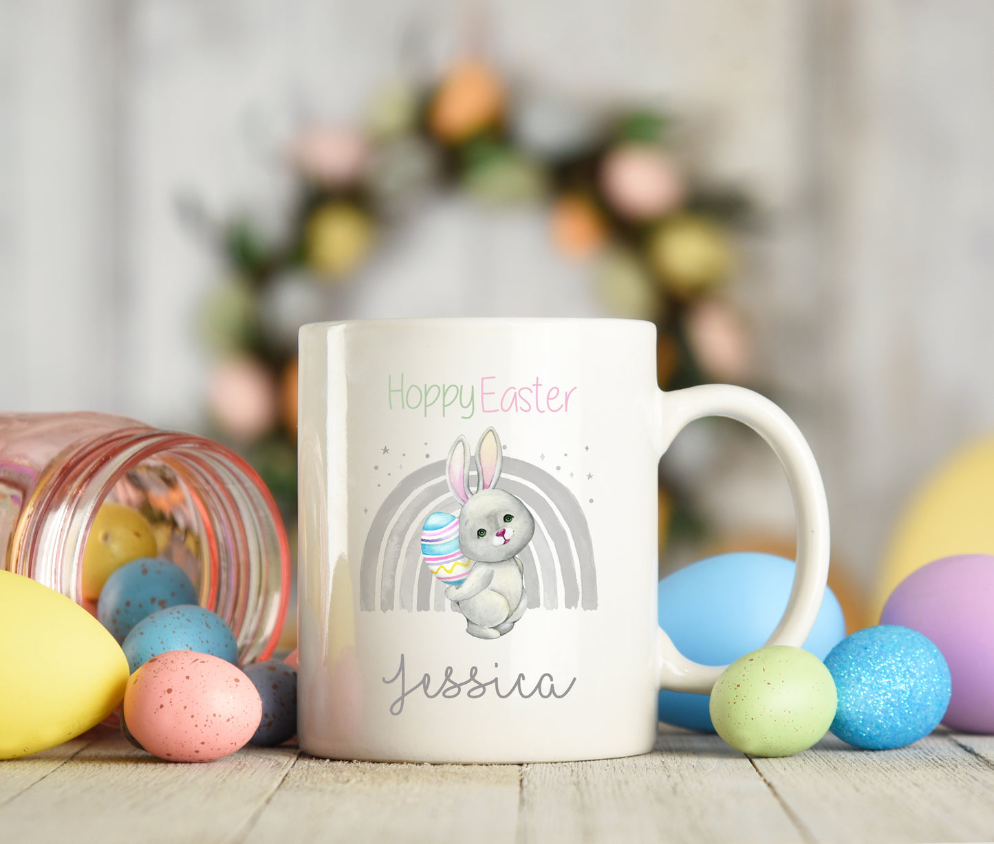 Personalised Mug with 'Happy Easter' and bunny design, surrounded by colourful Easter eggs.