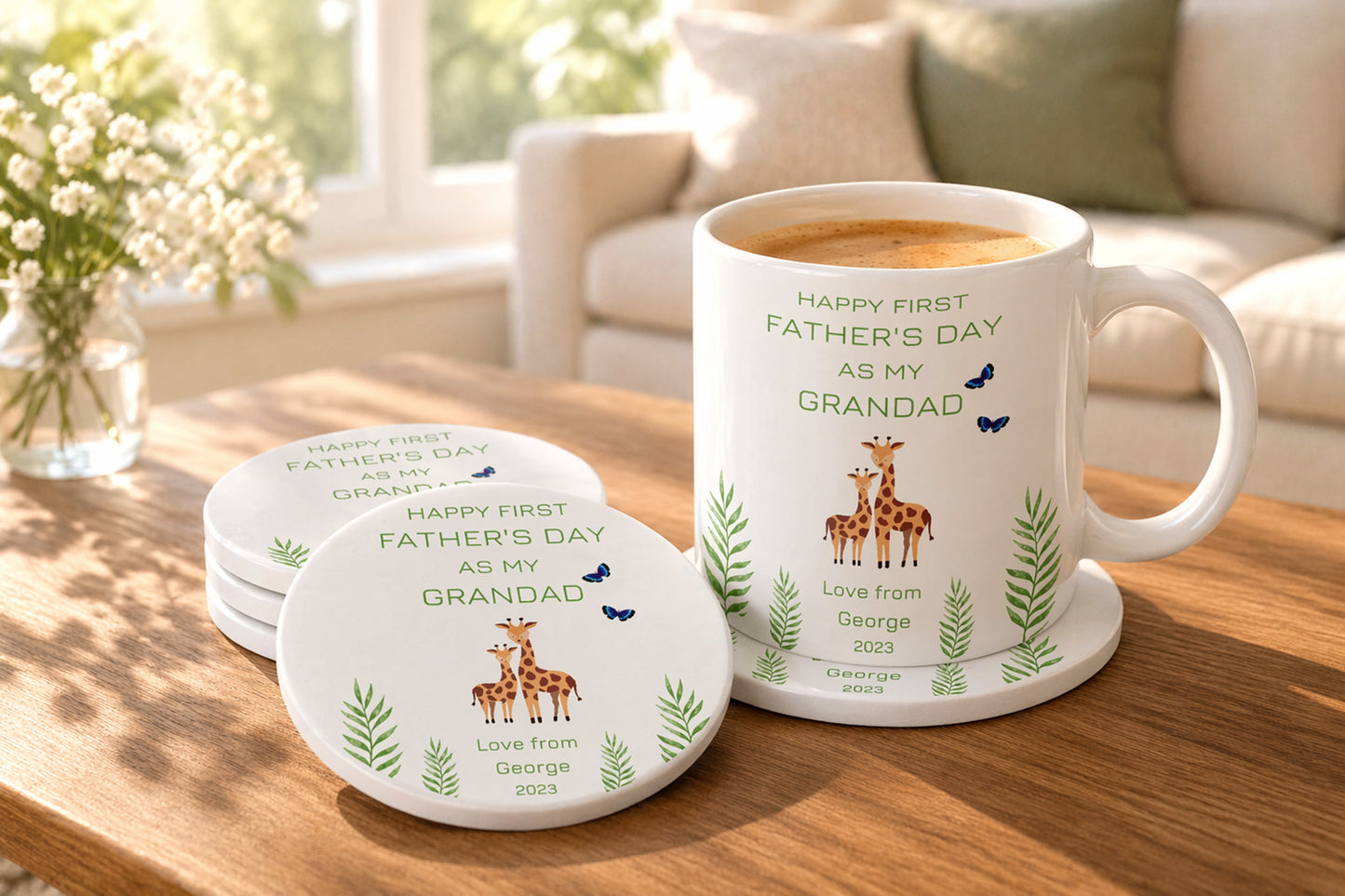 Mug and coasters with 'Happy First Father's Day as my Grandad' text on a wooden table.