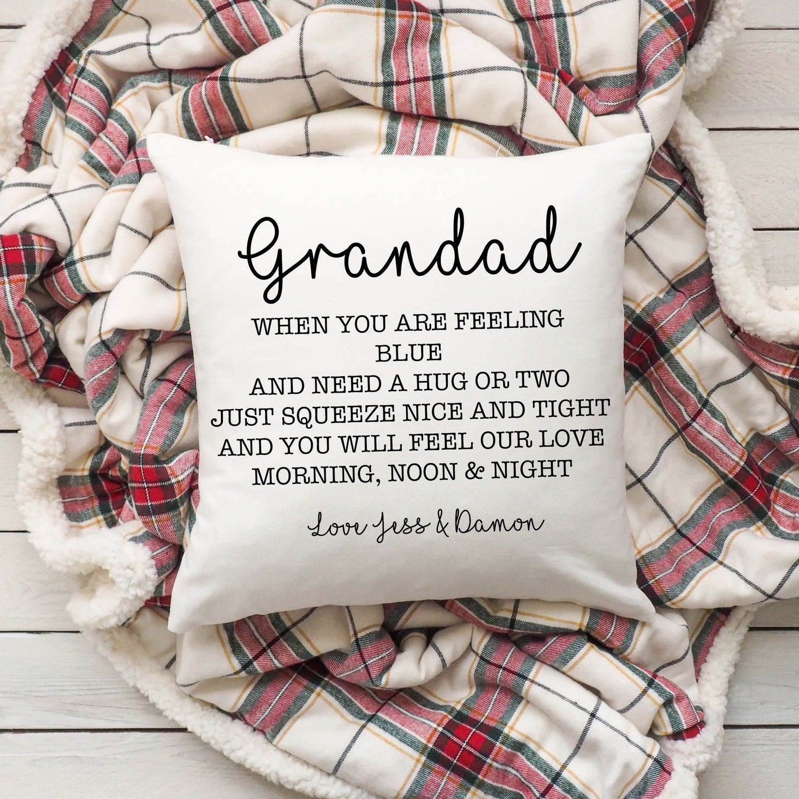 Personalised Decorative cushion with a message on a plaid blanket