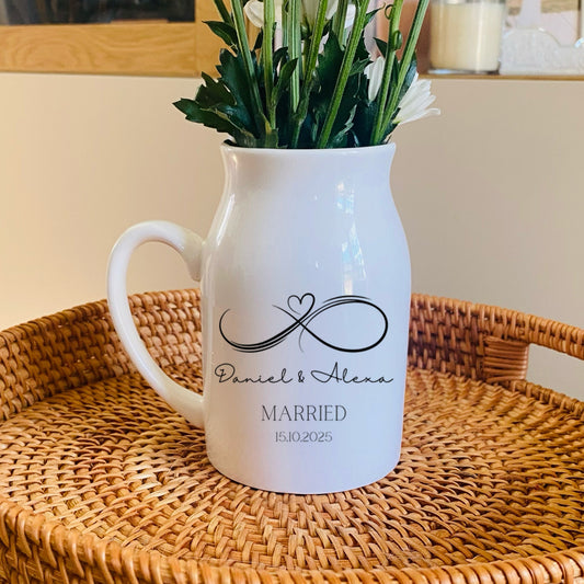 Personalised Wedding Vase, White pitcher with personalised design on a woven tray with flowers