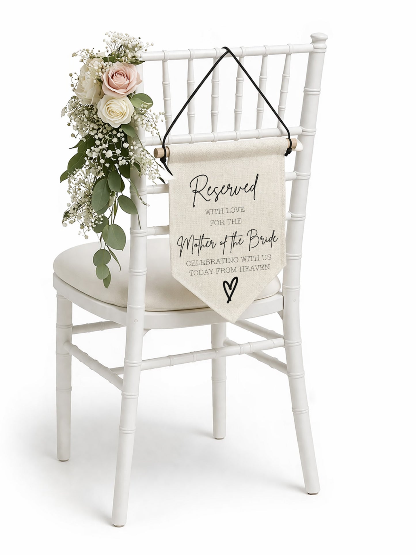 White chair with a floral arrangement and a 'Reserved' sign for the Mother of the Bride.
