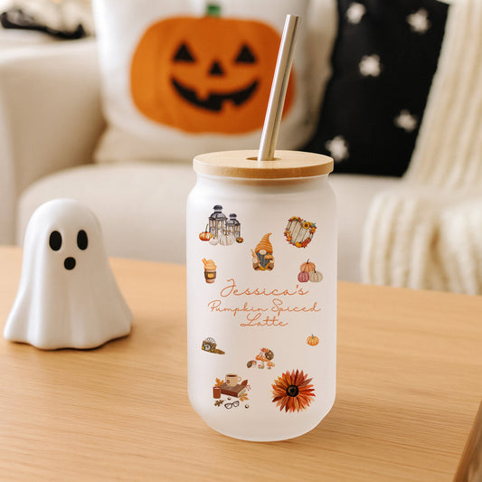 Tumbler with Halloween-themed design on a table with festive background